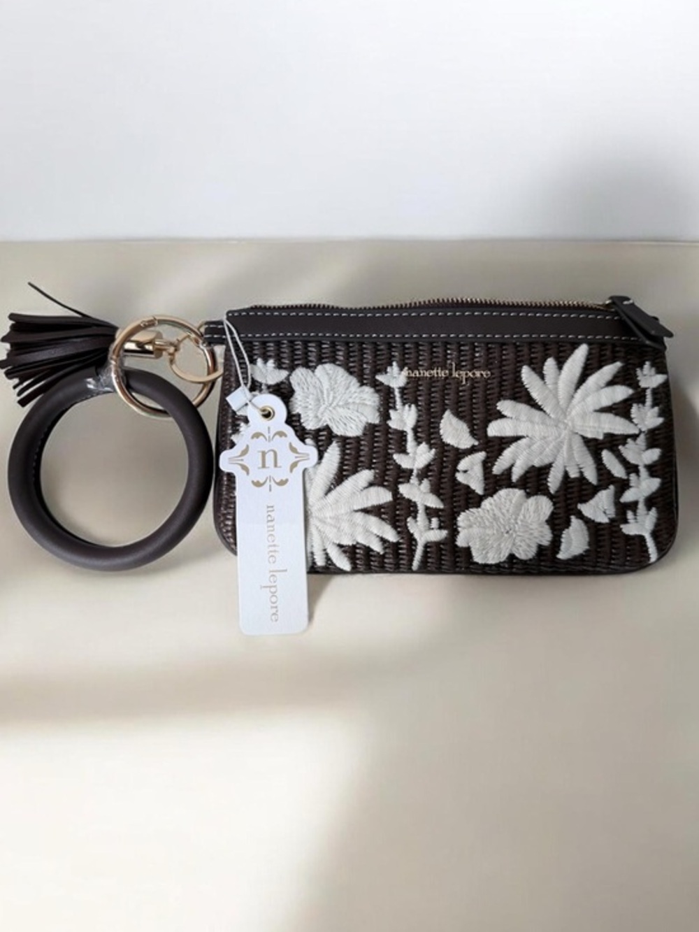 Nanette Lepore Dark Brown Woven Wristlet with Cream Floral Embroidery